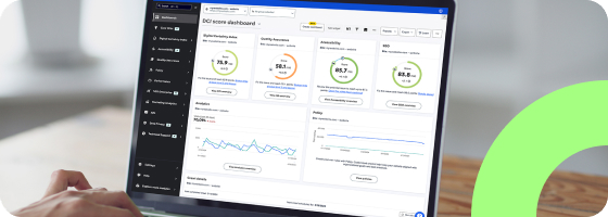 Hands typing on laptop looking at Siteimprove platform dashboard.